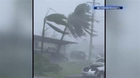 Super Typhoon Mawar hits Guam as a Category 4 storm with fierce win.